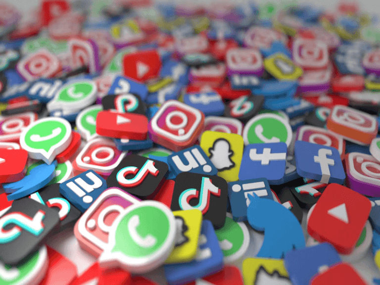 7 Best Social Media Management Strategies For Businesses 2 a pile of different colored social media icons for a social media management blog